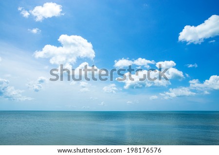 Beautiful sky and sea with white clouds. Royalty-Free Stock Photo #198176576