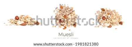 Muesli isolated on a white background. Granola isolated. High quality photo Royalty-Free Stock Photo #1981821380