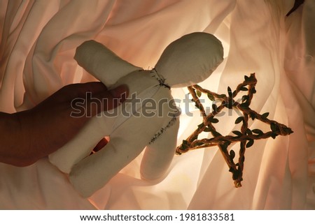 Ancient occult ritual, casting curses using dolls This picture is suitable for content about black magic.