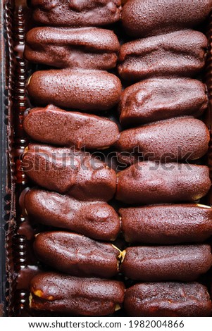 Chocolate Eclairs on the bed 