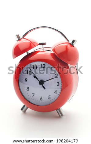 Red clock isolated on white
