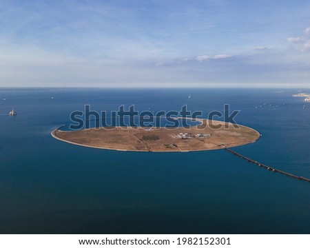 The Pearl artificial island in the South China Sea has developed into an international tourism and leisure island with the function of cruise home port as the core,integrating culture and entertainmet Royalty-Free Stock Photo #1982152301