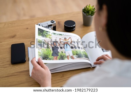 Looking Look At Family Photo Album. Memory Book