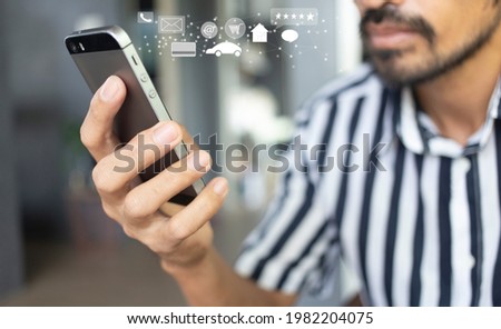 Young man using smartphone with social media network application during stay at home, connection, communication and application concept