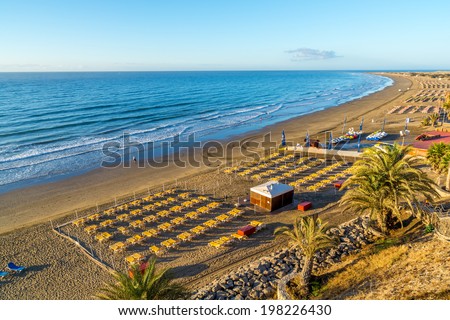 View over the beach of Playa del Ingles on Gran Canaria in Spain at sunrise Royalty-Free Stock Photo #198226430