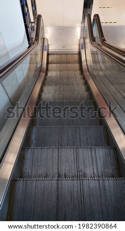 escalator in the building of the domestic terminal