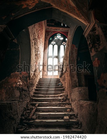 Light coming through a huge window in the haunted Spicer castle in Serbia Royalty-Free Stock Photo #1982474420