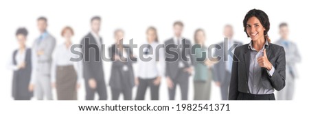Business woman with thumb up leading a successful corporate group isolated on white background