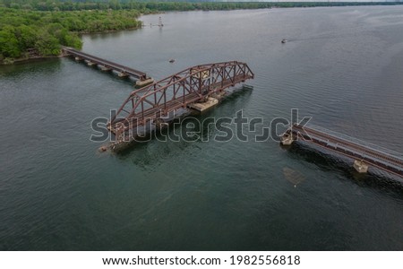 Swing rail road bridge over Richelieu river in Quebec, Canada not far from USA border