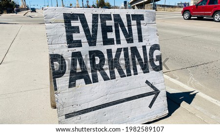 Event Parking Wooden Street Sign in City