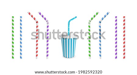 Drinking Striped and color straws for beverage. Straw and cup isolated on white background. Plastic fast food cup for cocktail or soda with straw. Royalty-Free Stock Photo #1982592320