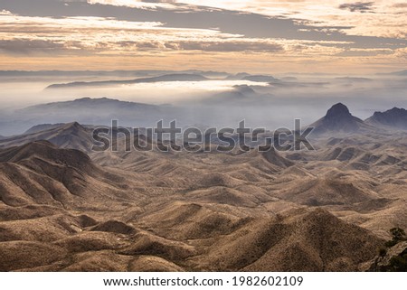 Rolling Hills And Fog South of The Chisos Mountians from the South Rim Trail Royalty-Free Stock Photo #1982602109