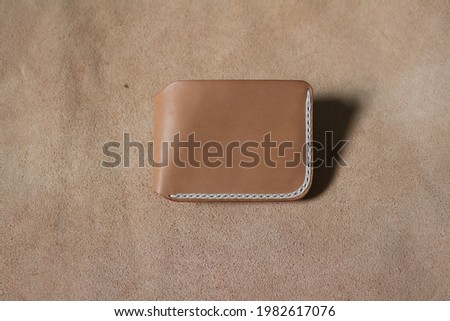 Photo shot of handmade leather wallet with vegetable leather material