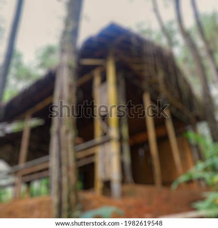 Blur photo of a wooden house or tree house located in a tourist village, namely SIKRIKIL, located in Wadaslintang
