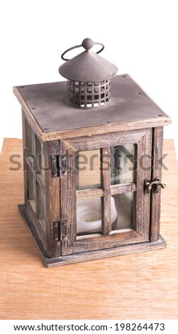 wood lantern with a candle