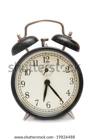 Black alarm clock isolated on a white.