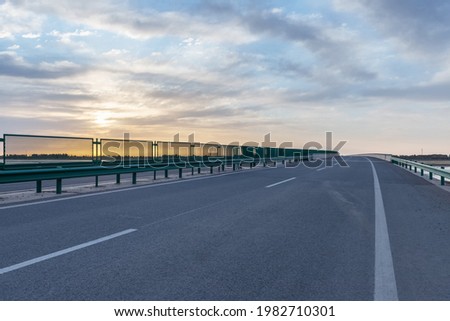 road bridge surface with sunrise sky, highway background