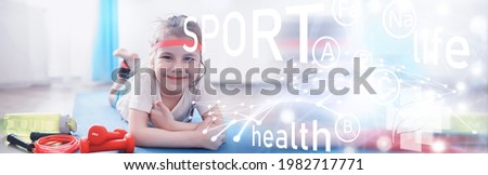 Sport and healthy lifestyle.Child playing sports at home. Yoga mat dumbbell and jump rope. Sports background with home exercises concept.