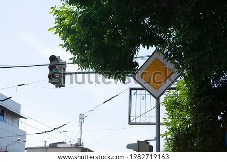 road sign and traffic light in the city