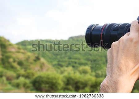 the photographer takes pictures of the forest