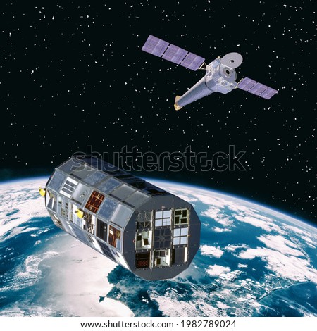 Spaceships in space. Science theme. The elements of this image furnished by NASA.