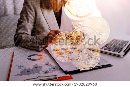 businesswoman hand working with laptop computer, tablet and smart phone in modern office with virtual icon diagram at modernoffice in morning light
