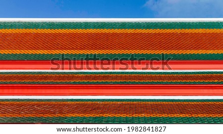 Panorama of Clay tile roof at Thai temple pattern and background seamless