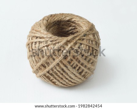 Spool of thread on white background 