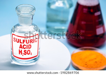 Reagent bottle with description: Sulfuric acid. a mineral acid composed of the elements sulfur, oxygen and hydrogen with the molecular formula H₂SO₄ Royalty-Free Stock Photo #1982869706