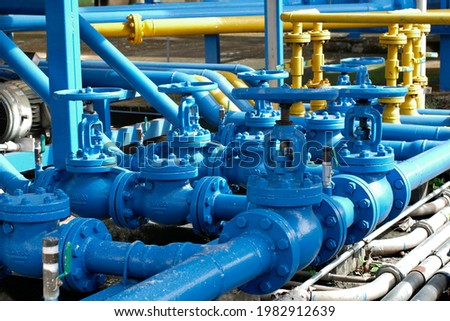 Valves at gas plant, Pressure safety valve selective focus Royalty-Free Stock Photo #1982912639
