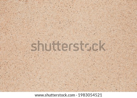 Abstract sand beach background concept, Vintage tone pattern of sand affected by the sun On sunny holiday and travel vacation at a tropical beach in southern Thailand.