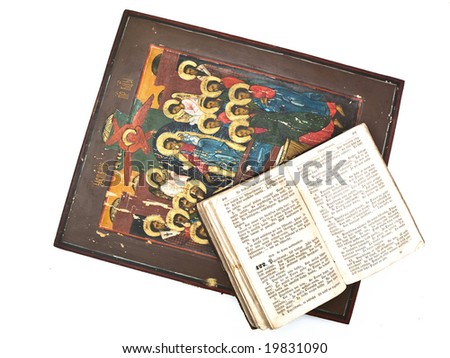 Photo of the Icon and Bible over the white background