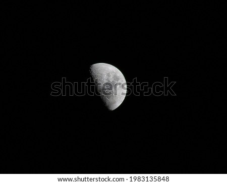 Beautiful half moon on the dark knight high-quality pic.