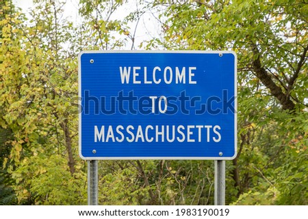welcome sign to Massachusetts in blue color