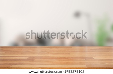 Empty of wood table top on blur of white clean  abstract and blur interior background with bokeh.used for display or montage your products. banner
