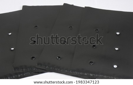 Black bags used for planting seedlings Royalty-Free Stock Photo #1983347123