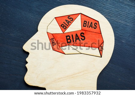 Head with a puzzle inside and an inscription bias. Royalty-Free Stock Photo #1983357932