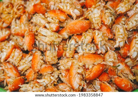 Crispy Sand Crab or Undur-undur Laut Goreng, Fried seafood snacks from Gunung Kidul Beach, Yogyakarta, Indonesia. Selective focus and noise food texture.