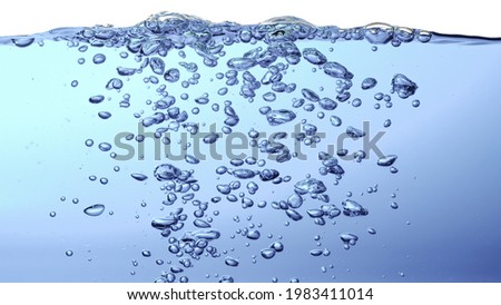 Water splash isolated on white. fresh blue natural drink water wave wide panorama. bubbles underwater background.