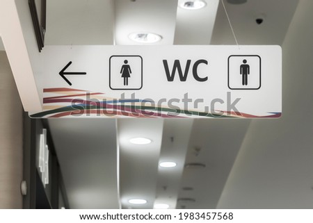 restroom wc, white sign in the mall, toilet sign