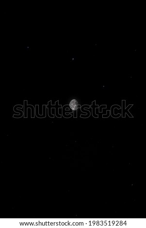 Moon and star at night time