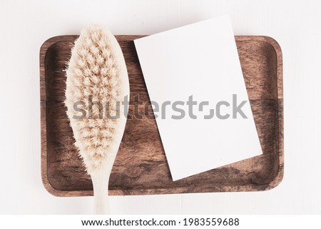 Blank portrait mock-up paper. brochure magazine isolated on brown wooden, white paper isolated on wood