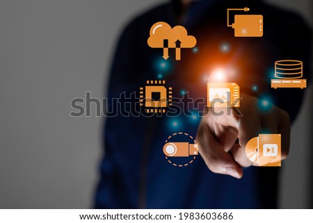 A man touch the light, data and computer storage yellow icon  technology and network concept computer graphic light, shot with copy space 