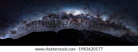 Milky Way Panorama High Res with mountains at Aoraki Mackenzie International Dark Sky Reserve Royalty-Free Stock Photo #1983620177
