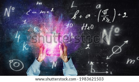 Formulas on blackboard background . Mixed media