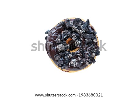 Flatlay of chocolate frosted donut with crumbled cookies isolated over a white background with clipping path included.