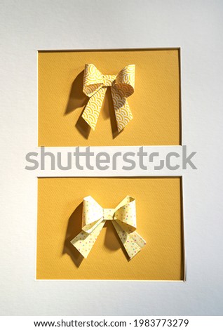 colored paper bows, Handmade with origami technique. Concepts of Parties and gifts for the house.