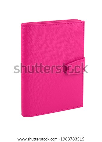New pink wallet of genuine cattle leather. Isolated on white background. Close-up shot 