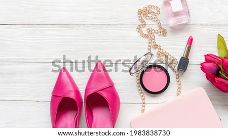 Fashion bag and shoe woman accessories pastel background. Trendy fashion luxury handbag, shoe, perfume and cosmetic design. Lifestyle and Beauty Concept