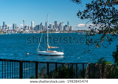 View of Sydney City with water and boat in front